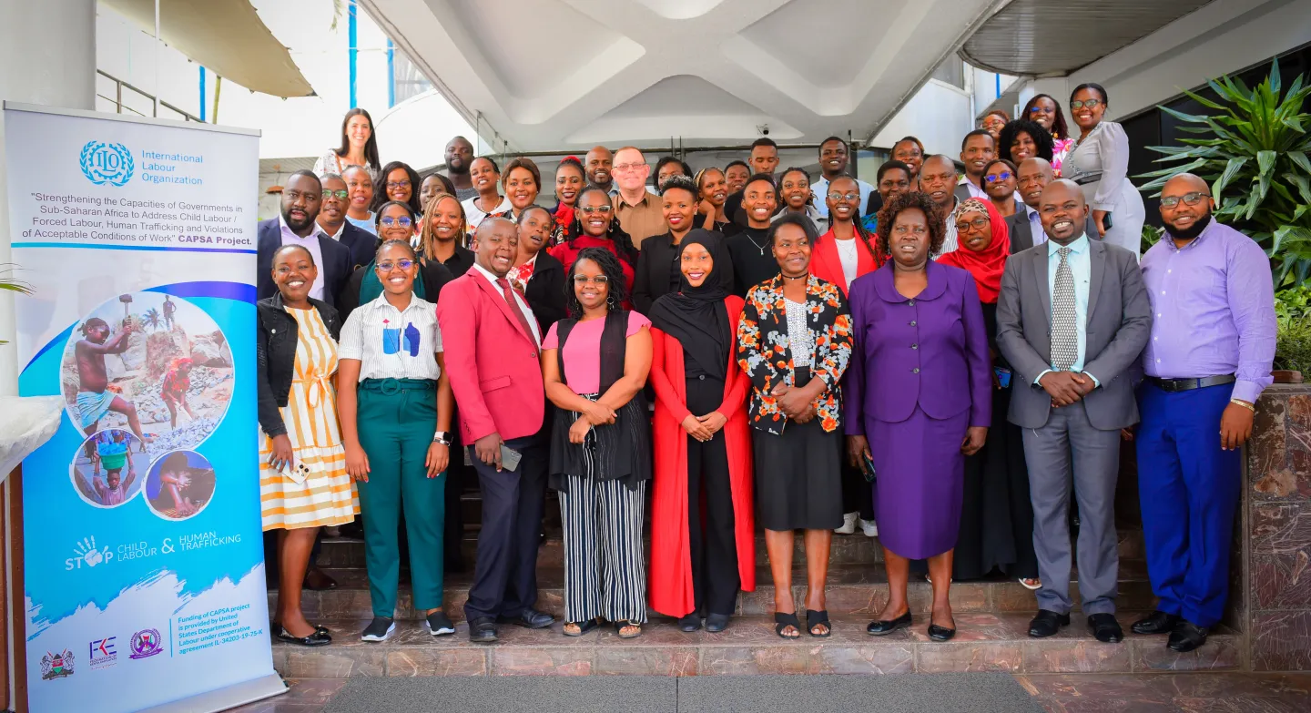 Stakeholders pose for a group photo during the strategic workshop for Kenya's Alliance 8.7 Roadmap.