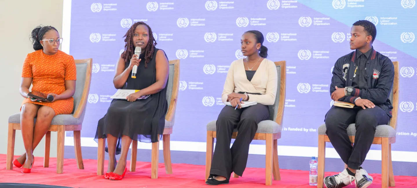 One of Survivor Network Leaders (With Mic) Engaged in a Panel Discussion During the CAPSA Partners' regional knowledge sharing and closeout conference