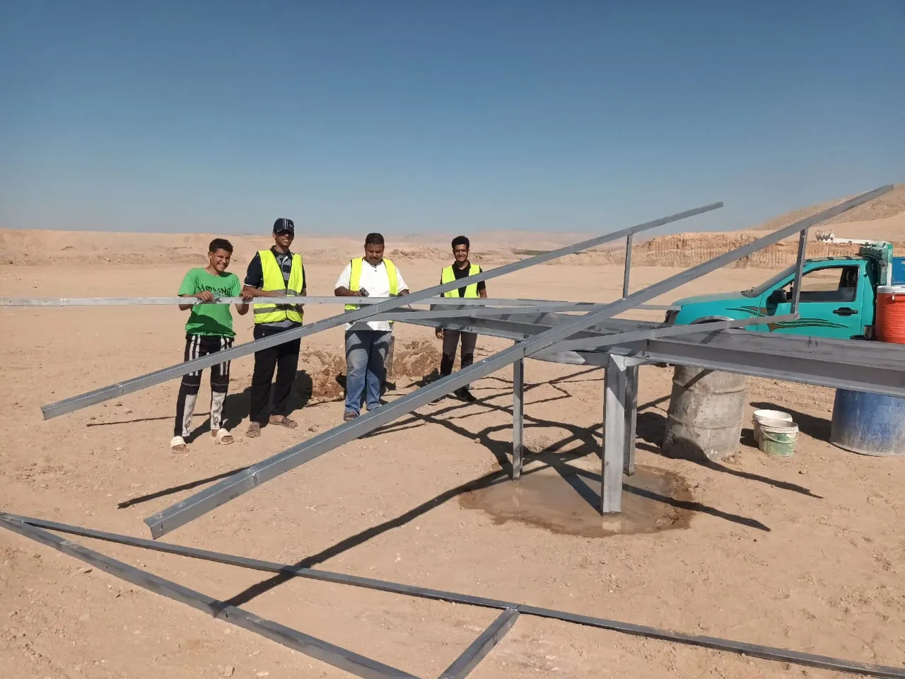 Solar panels installed in Egypt, showcasing renewable energy technology in a desert landscape.