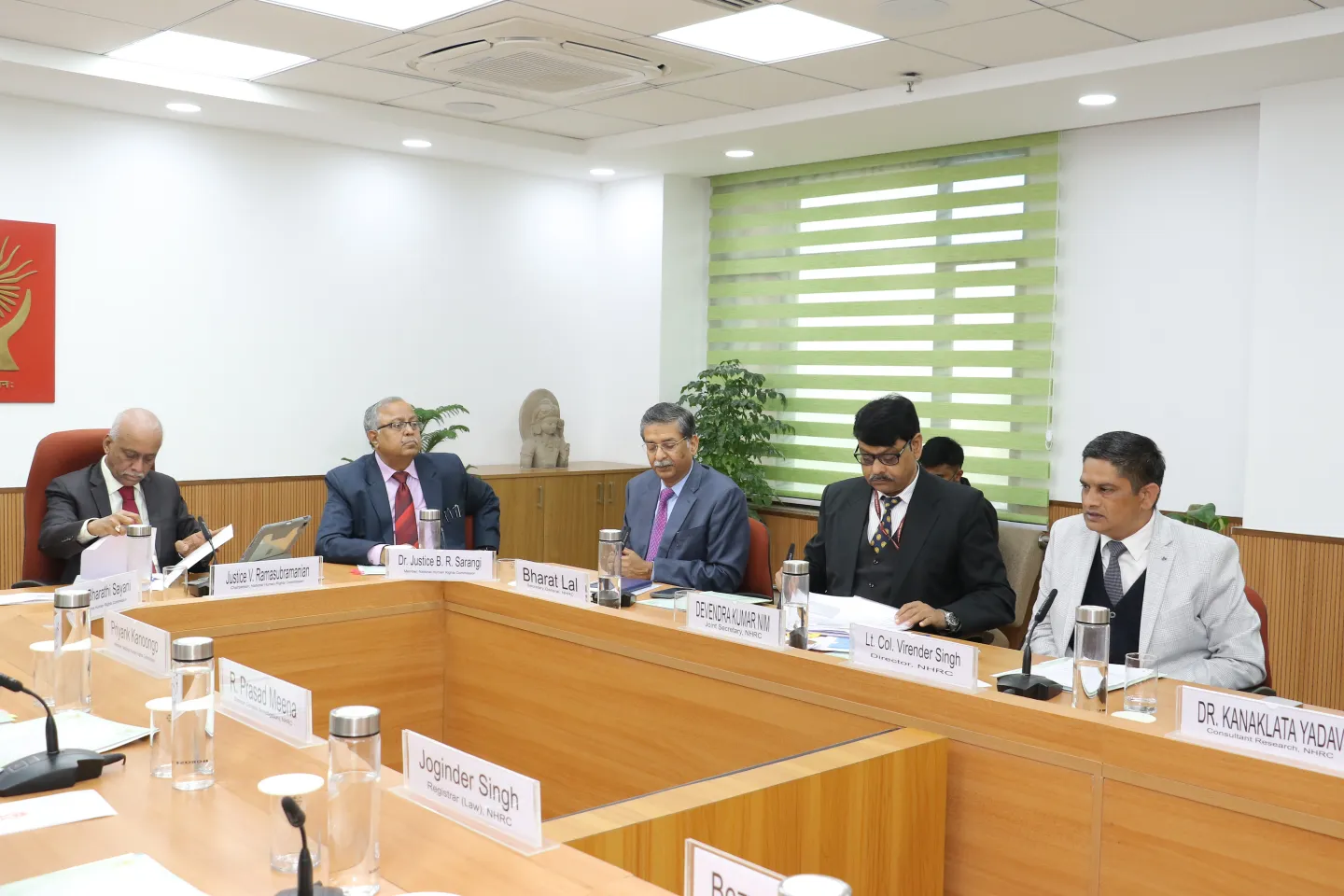 Men sitting in a conference room