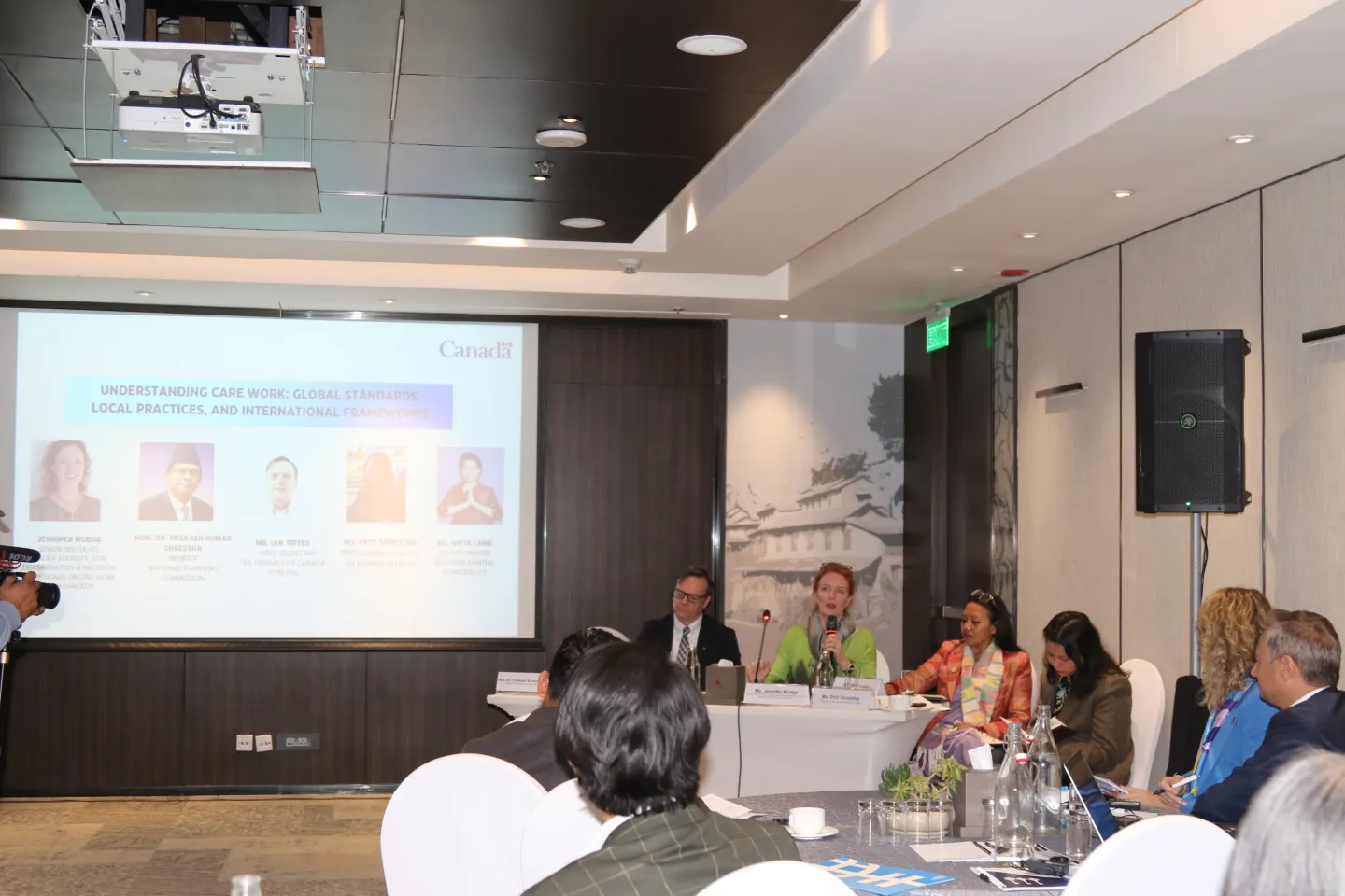 Panelists discussing care work- global standards, good practices, local level initiatives and international frameworks.
