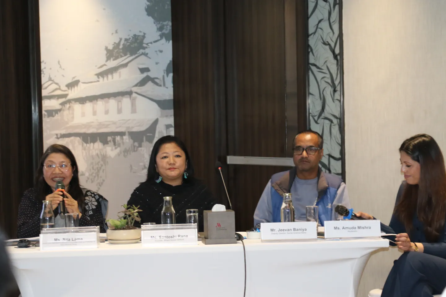 Panelists highlighting the initiatives and situation of care workers in Nepal.
