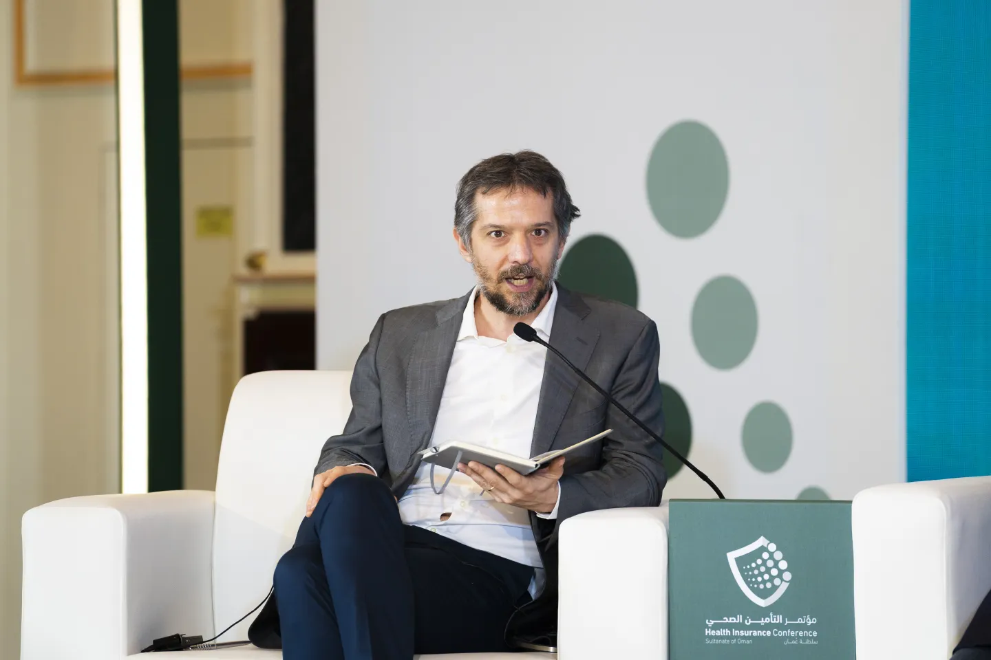 Luca Pellerano, ILO Senior Regional Social Protection Specialist, leading a panel discussion on day one of the conference, Muscat, Oman 