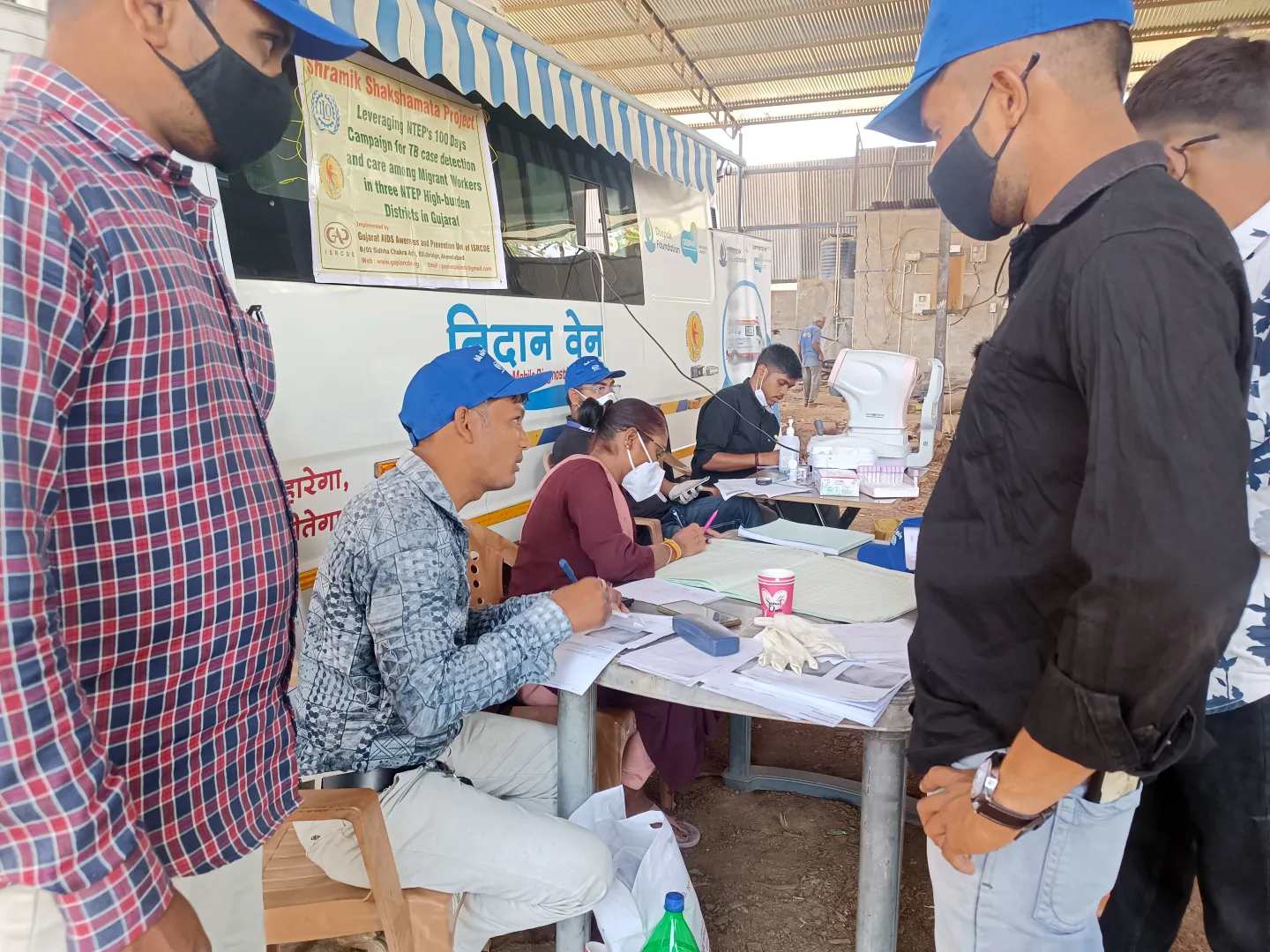 Men at a workplace TB-HIV testing site
