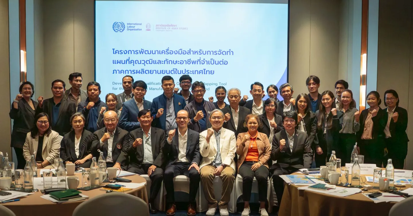 Workshop participants gather for a group photo