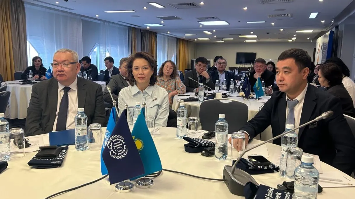 Participants sitting at round tables