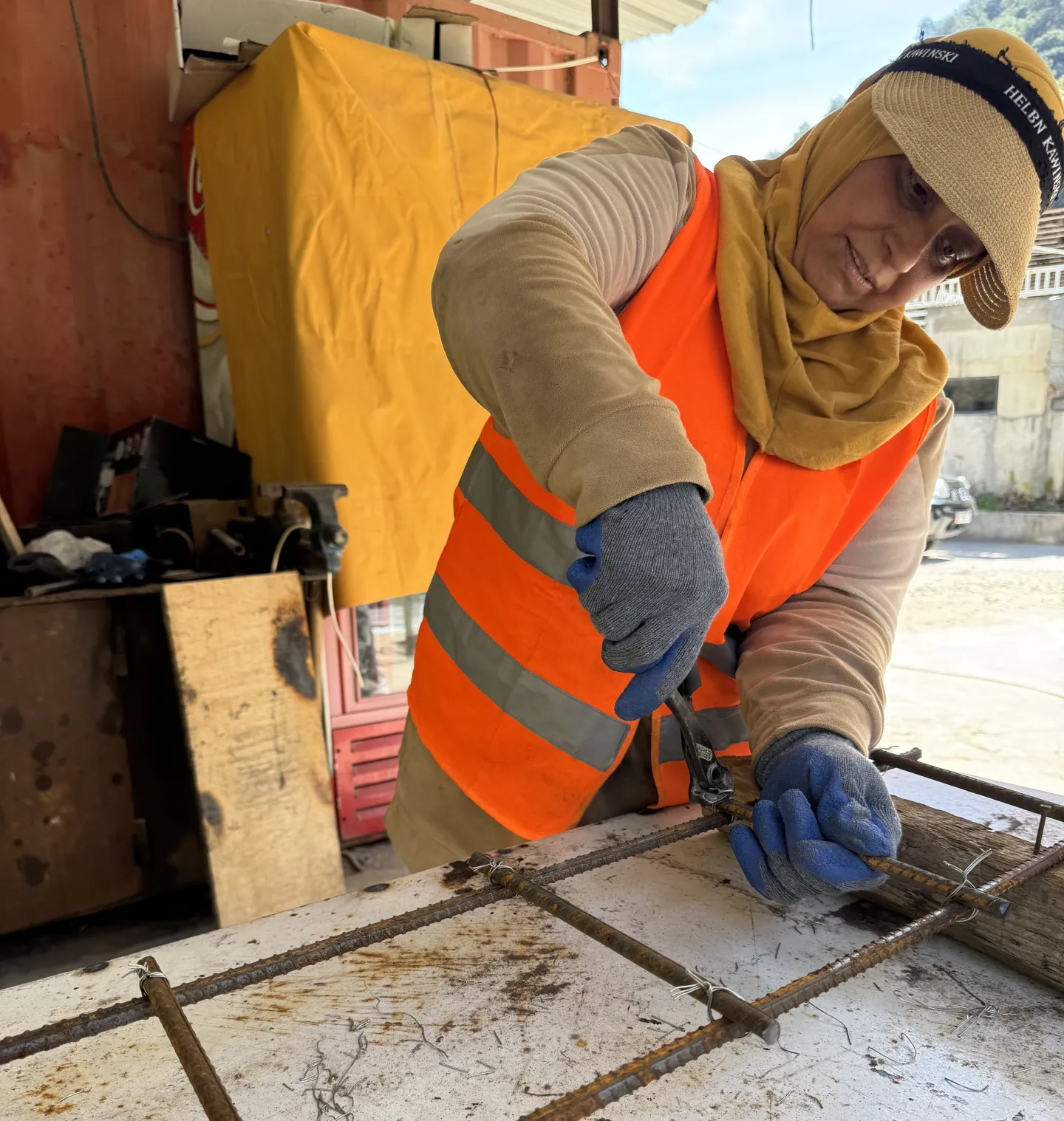Oum Metres tying steel to prevent movement during concrete pouring. Damour, Lebanon, March 2025