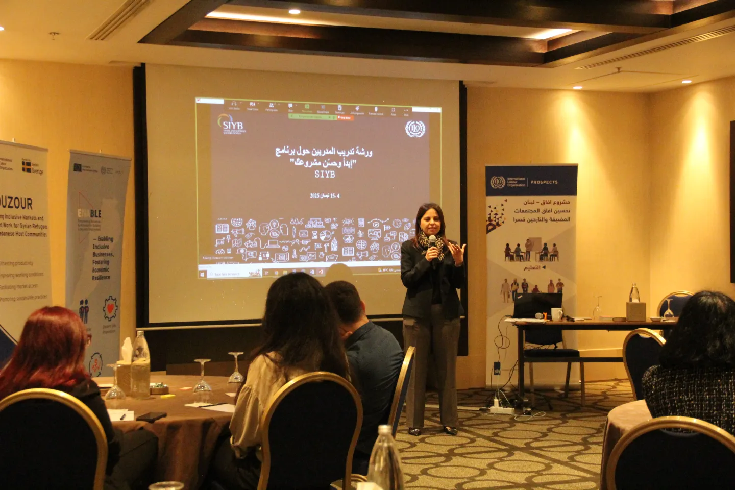 a lady giving a presentation