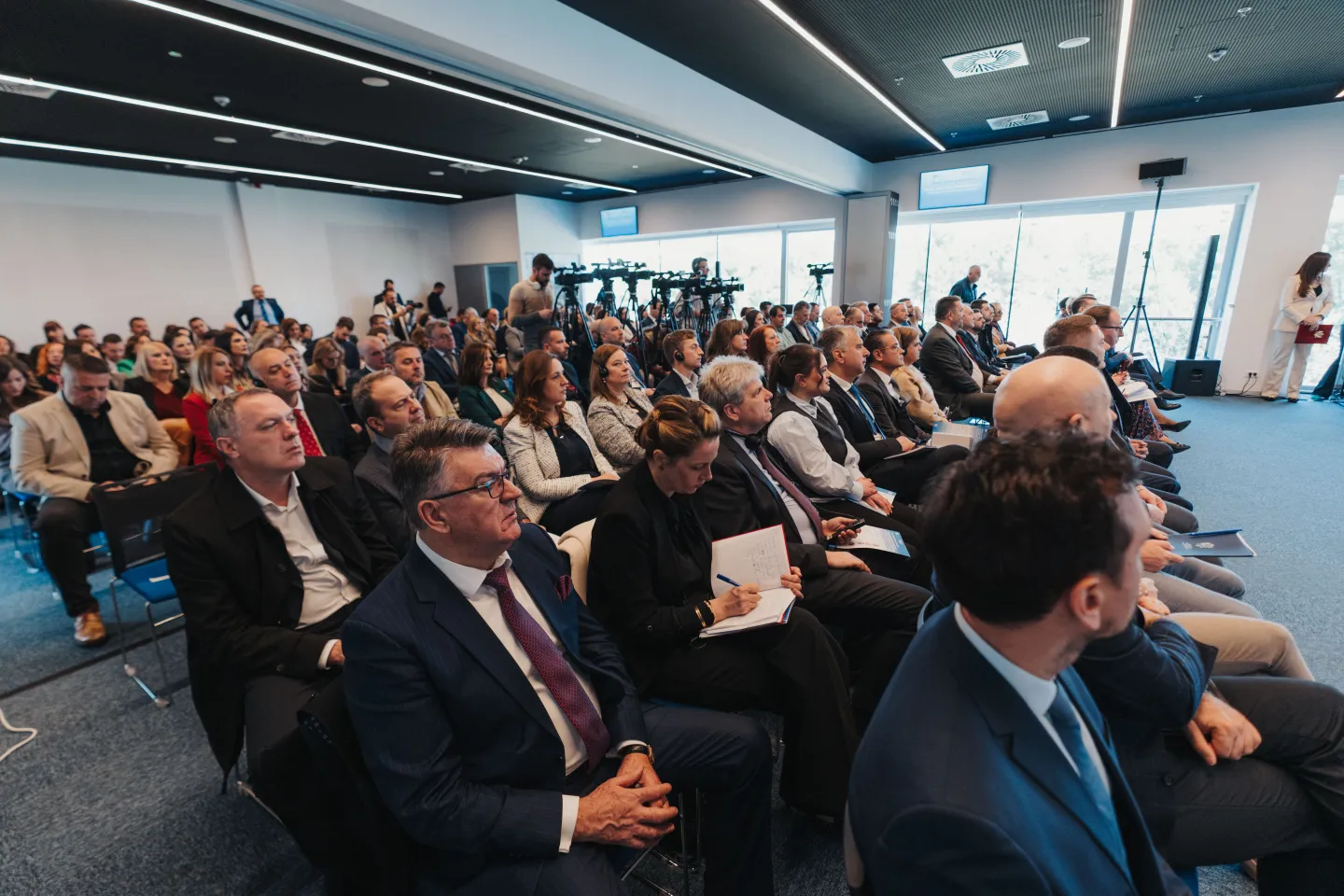 A meeting hall full of people