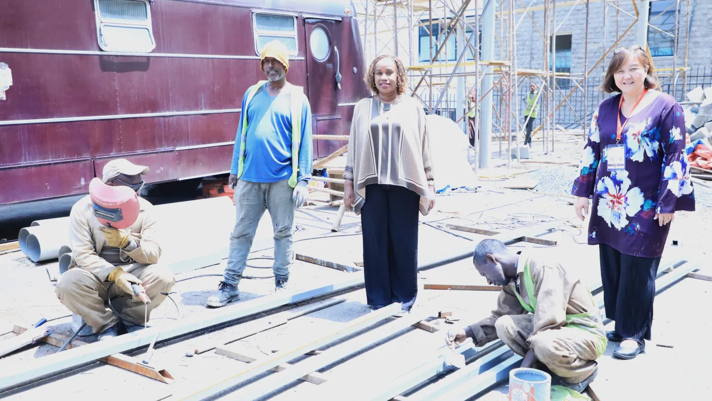 ILO officials (both female) visiting employment site in construction