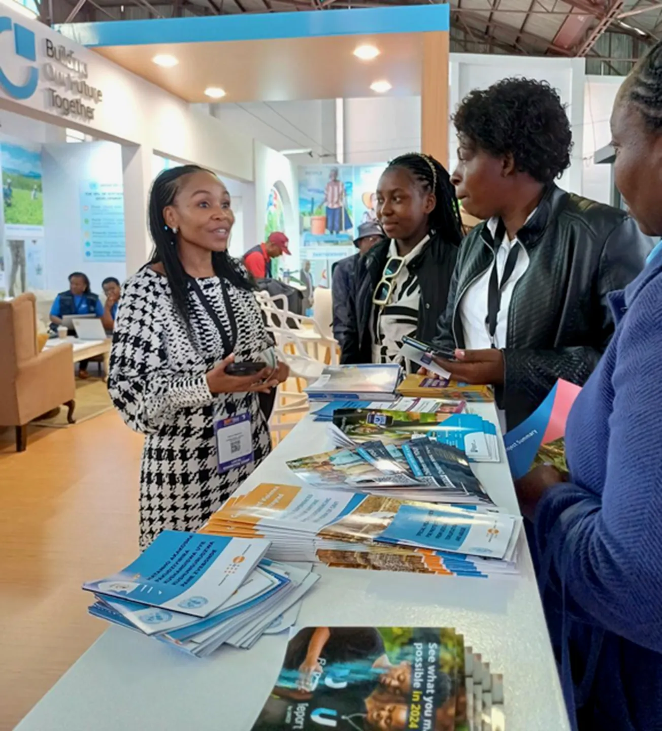 Earlier at the Zimbabwe International Trade Fair 2025, Philile Masuku, Director of ILO Zimbabwe and Namibia chatting with visitors to the UN stand.