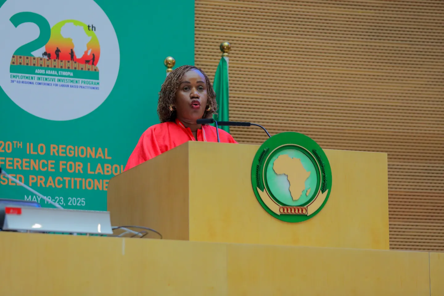 ILO Assistant Director-General and Regional Director for Africa, Fanfan Rwanyindo speaking at a podium