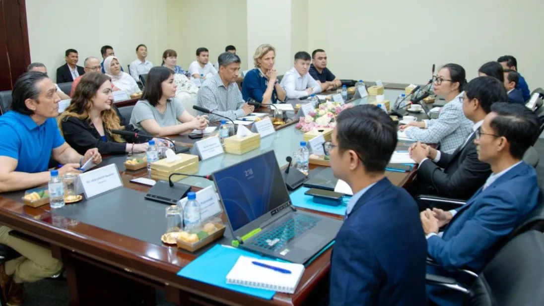 A group of people sitting at a table