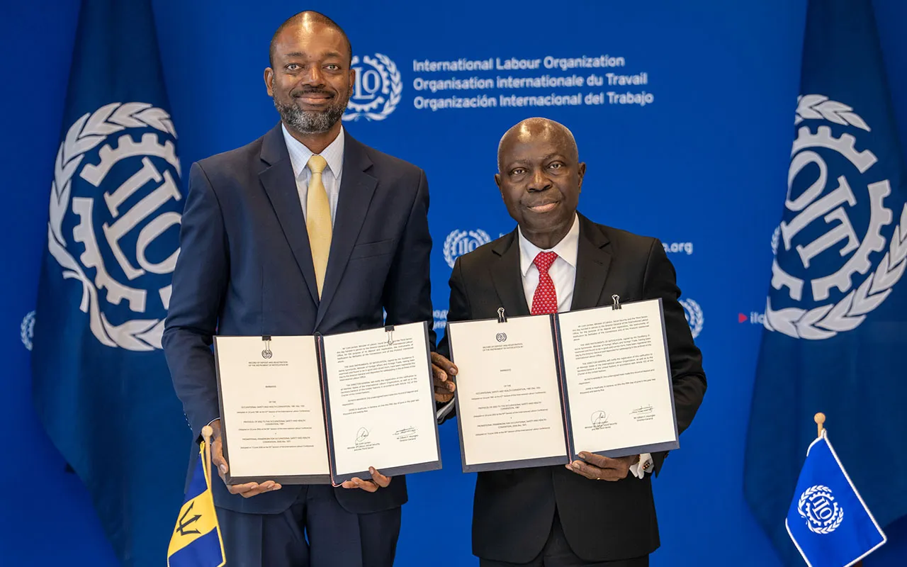 Mr. Colin E. Jordan, the Minister of Labour, Social Security and Third Sector of Barbados, presents the instruments of ratification of Convention No. 155, its Protocol and Convention No. 187 to the ILO Director-General, Gilbert F. Houngbo. 5 June 2025.