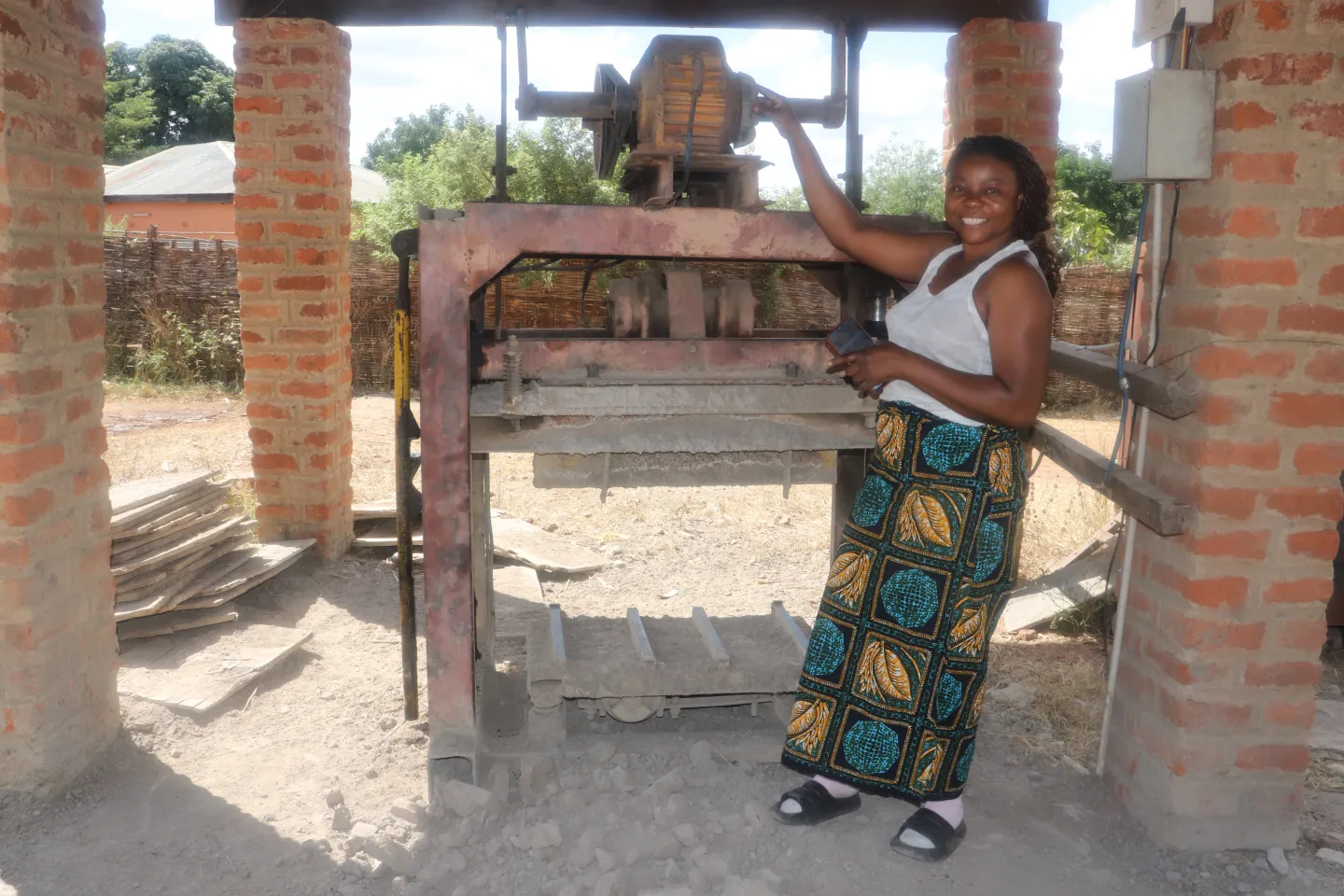 Sarafina Nyirenda is using a solar-powered block-making machine to enhance productivity.