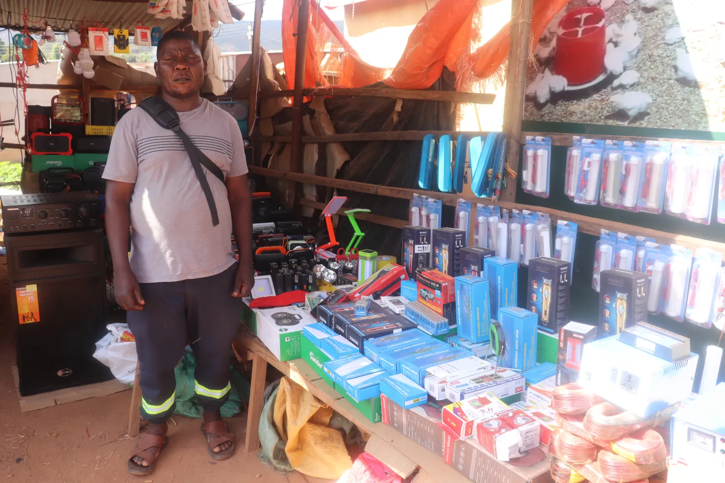 Peter Zulu, a solar products trader at Chipata’s Downtown Shopping area.