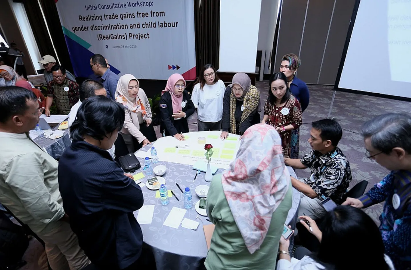 Group session with people sitting on the round table