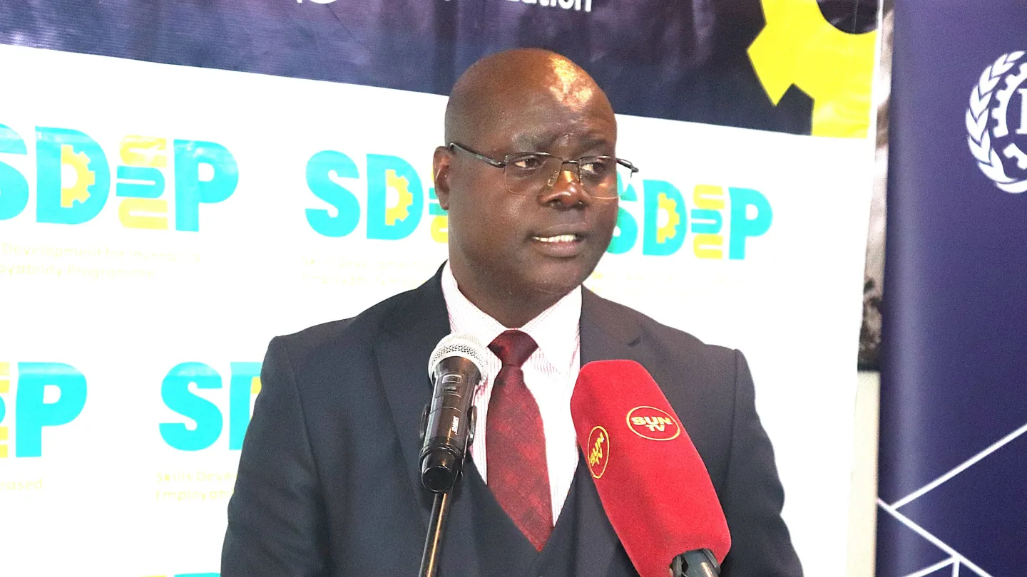 Mr. Zechariah Luhanga speaks at the workshop.