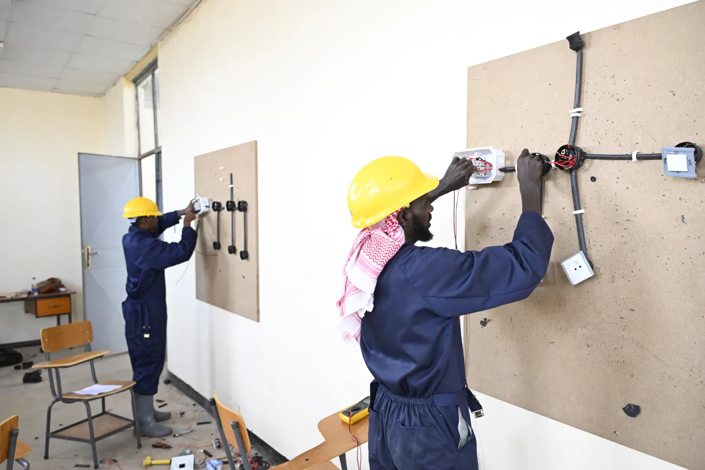 Trainees practicing electrical installation