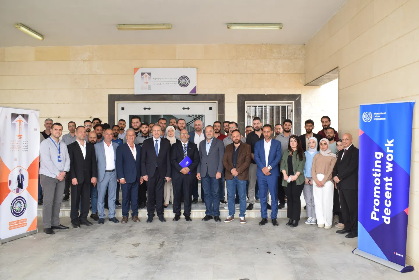 Group of people in front of training centre in Syria