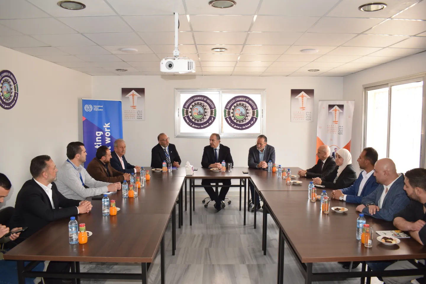 A group of meeting participants at Damascus Chamber of Industry in Syria