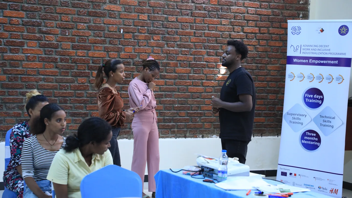 Young men and women in a role play. 