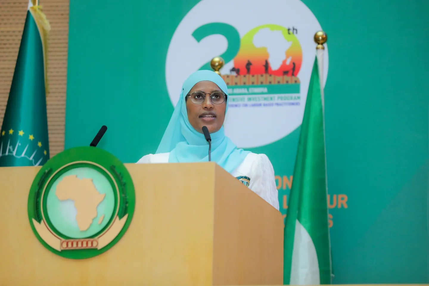 Woman standing at a podium