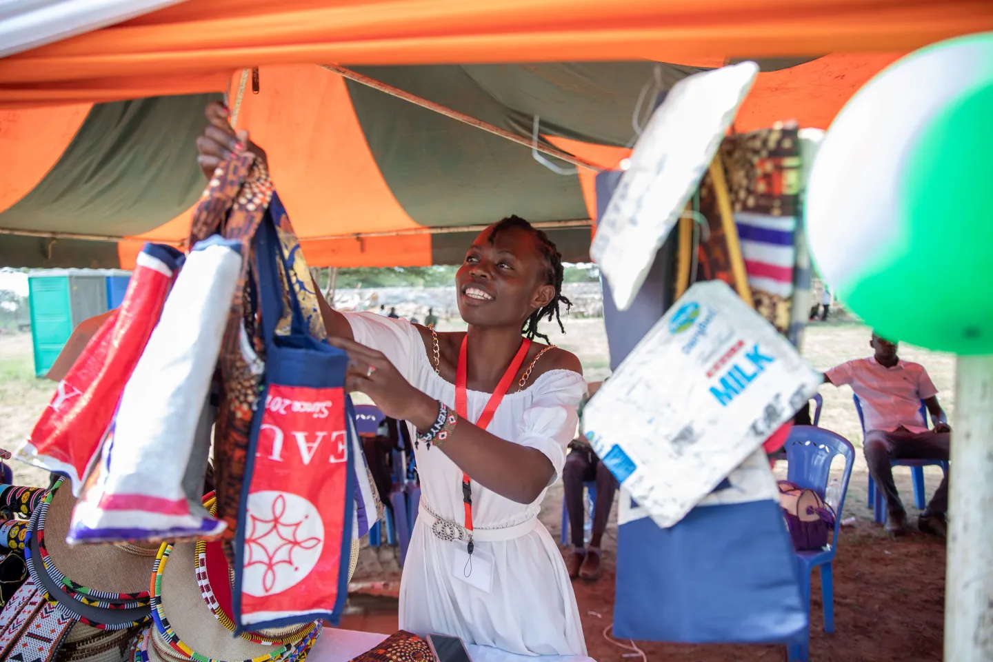 A female entrepreneur showcasing her wares