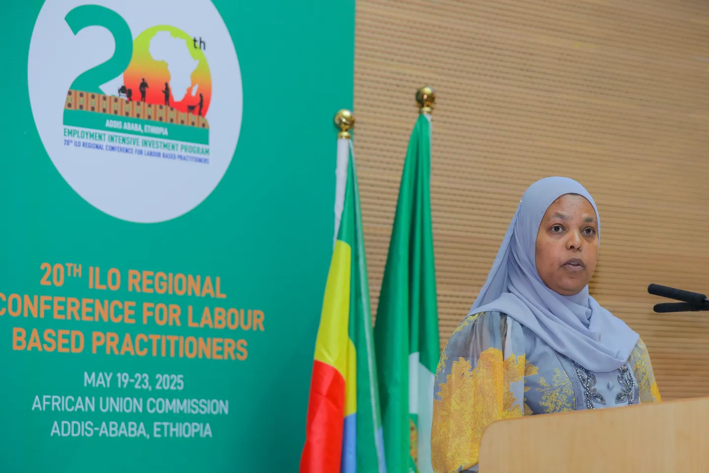 Woman standing at a podium