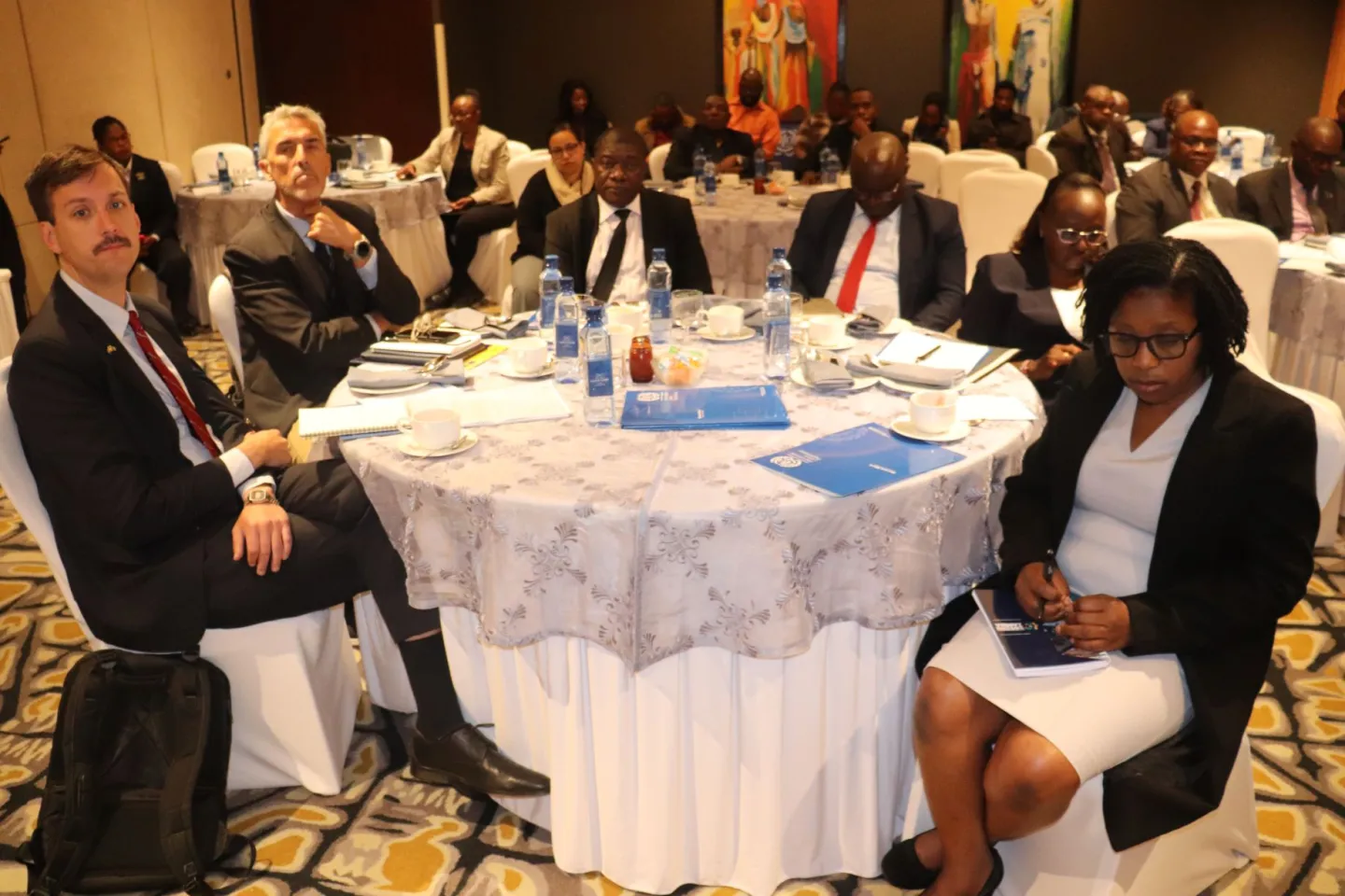 Participants follow through the proceedings at the event in Lusaka.