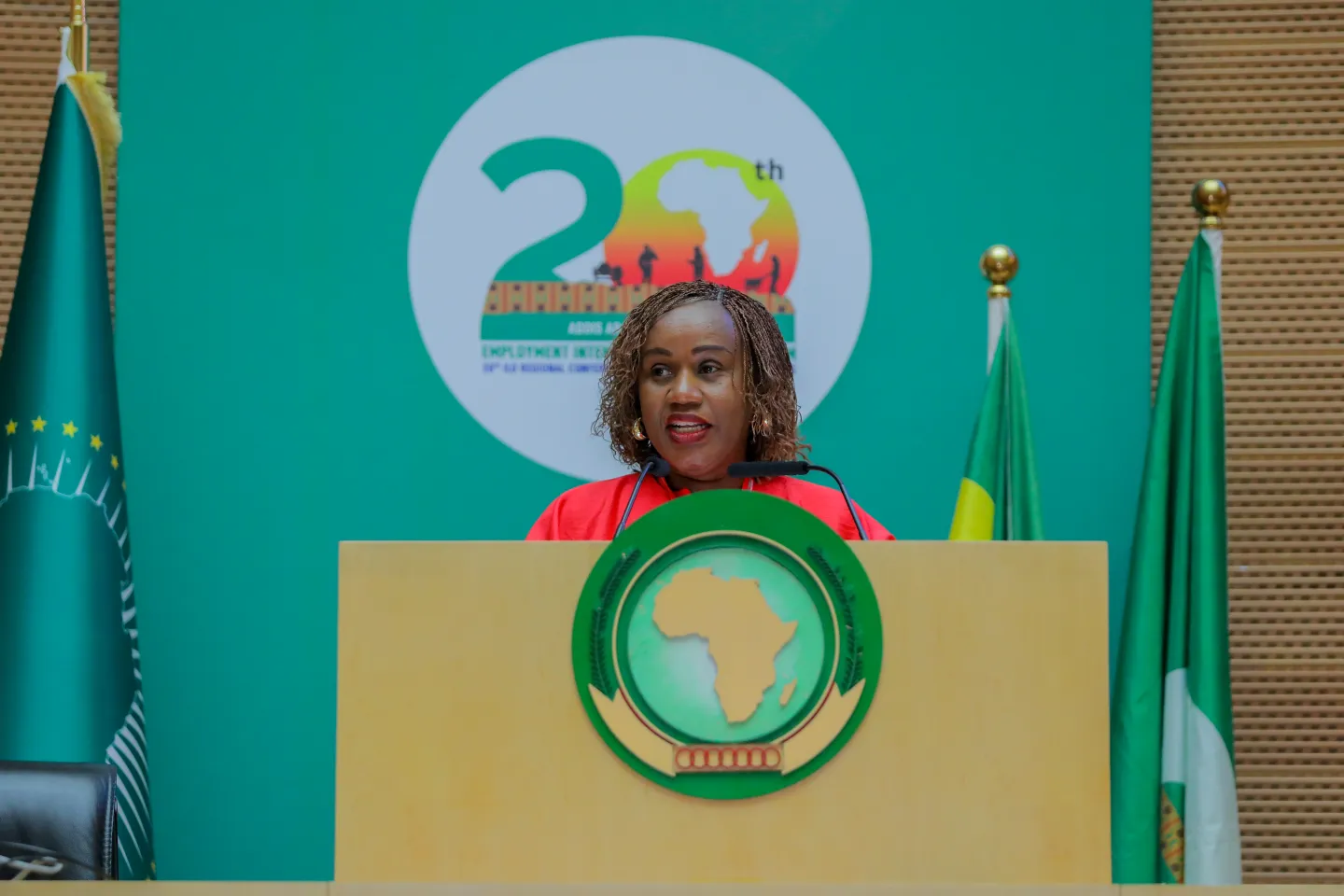 Woman standing at a podium