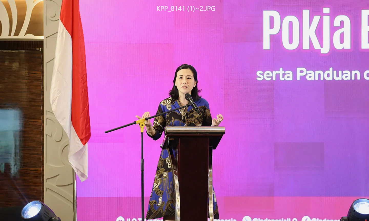 A woman standing on the podium