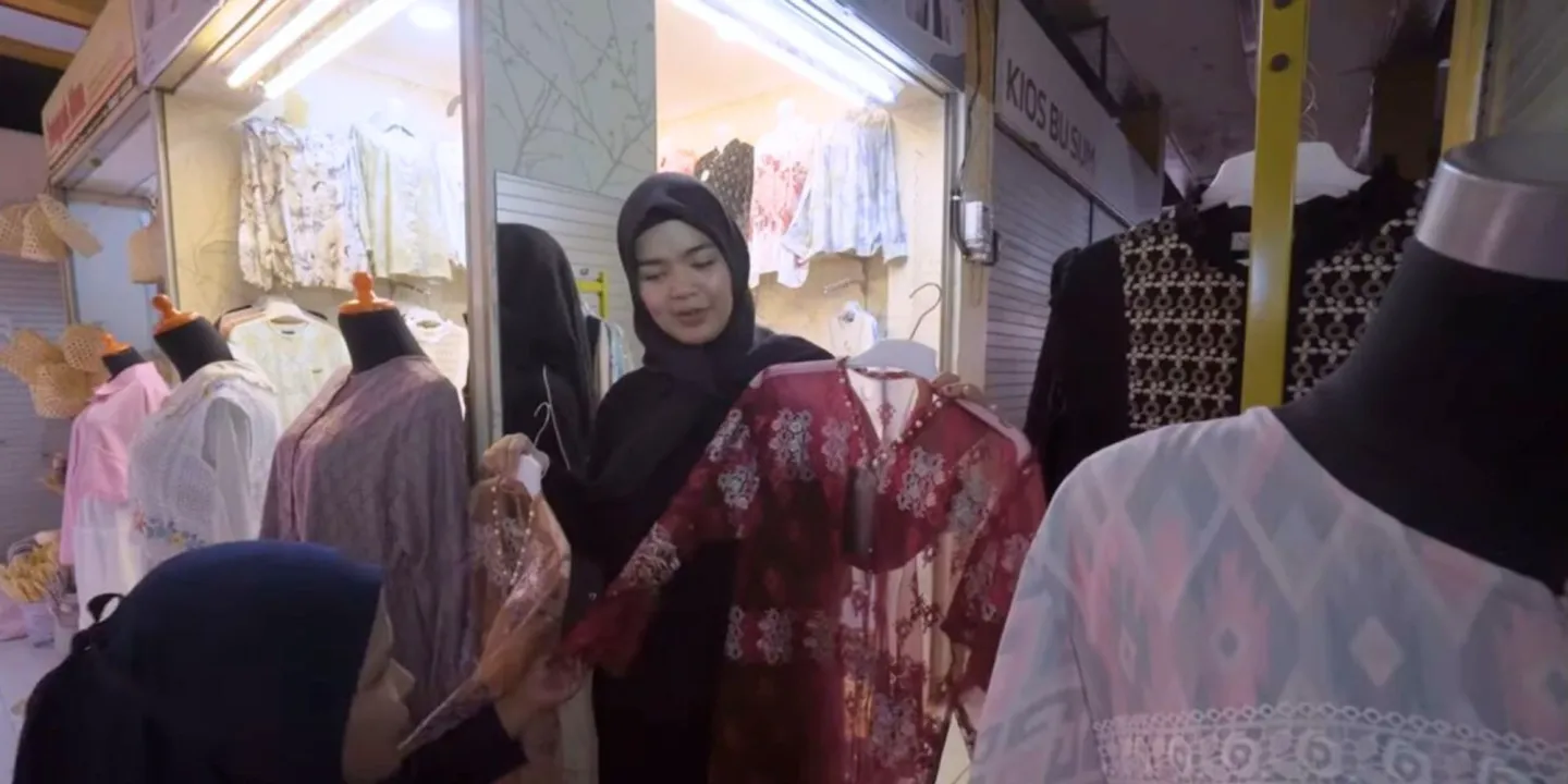 A woman selling clothes