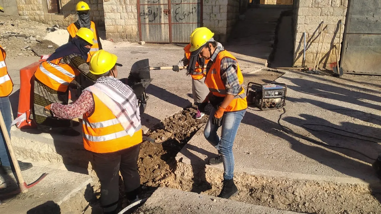 Workers engaged in public space enhancement in Rachaya, West Beqaa.