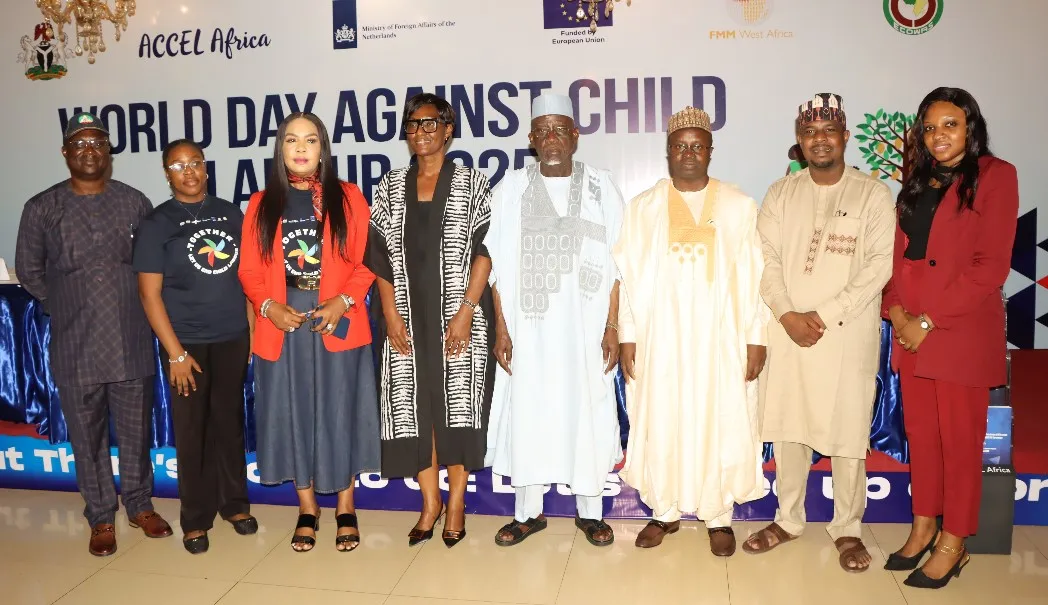 Tripartite partners and ILO officials in a group photo to mark World Day against Child Labour 2025