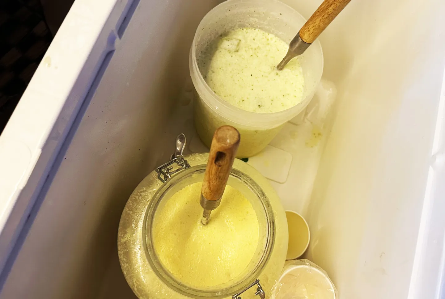 Coconut drinks in two containers.