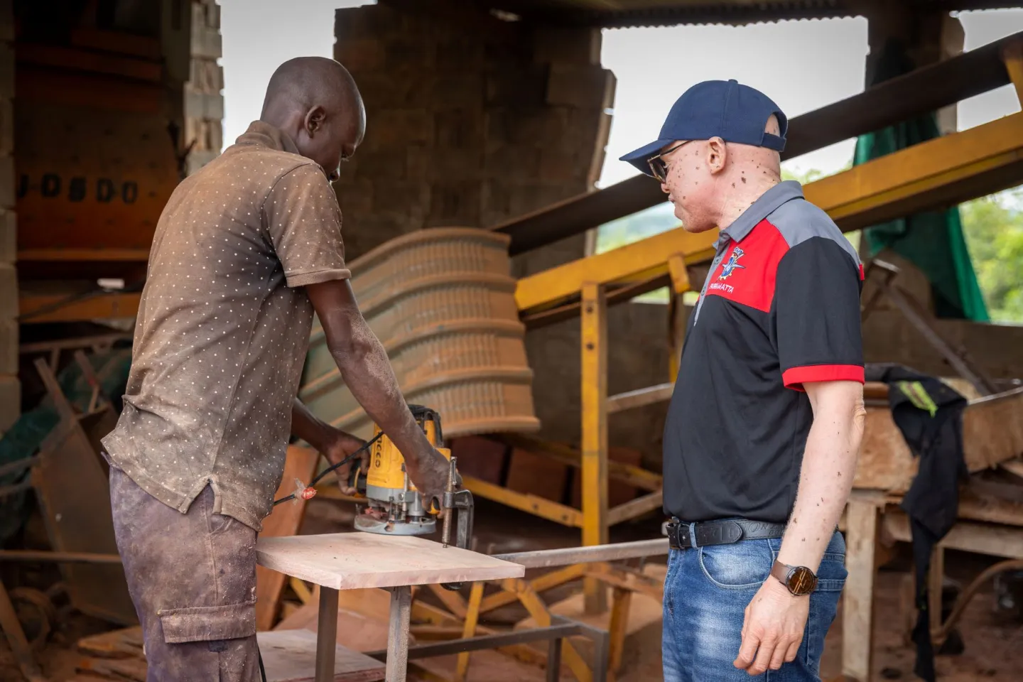 Norris Mphanga with one of his co-workers.