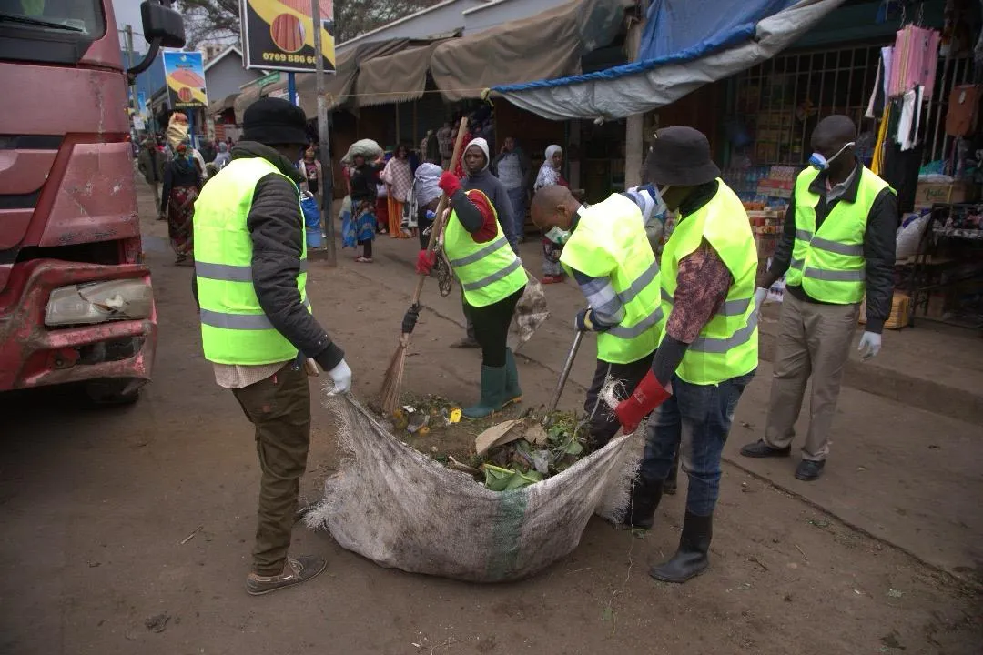 Sanitation workers in the street 