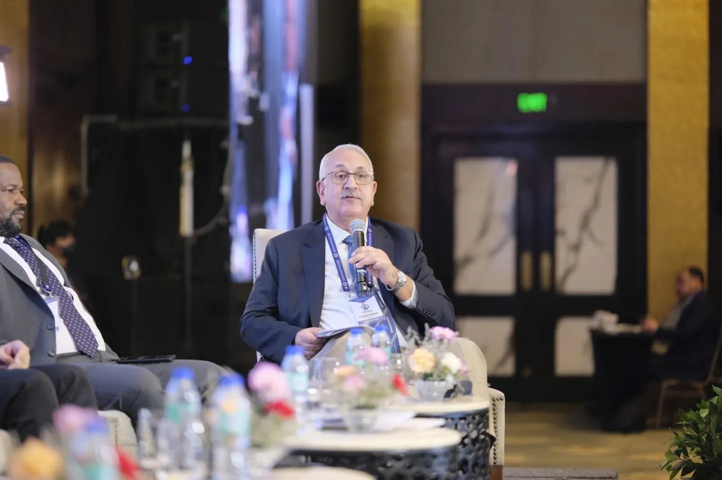 ILO Director Khalid Hassan speaking at the plenary