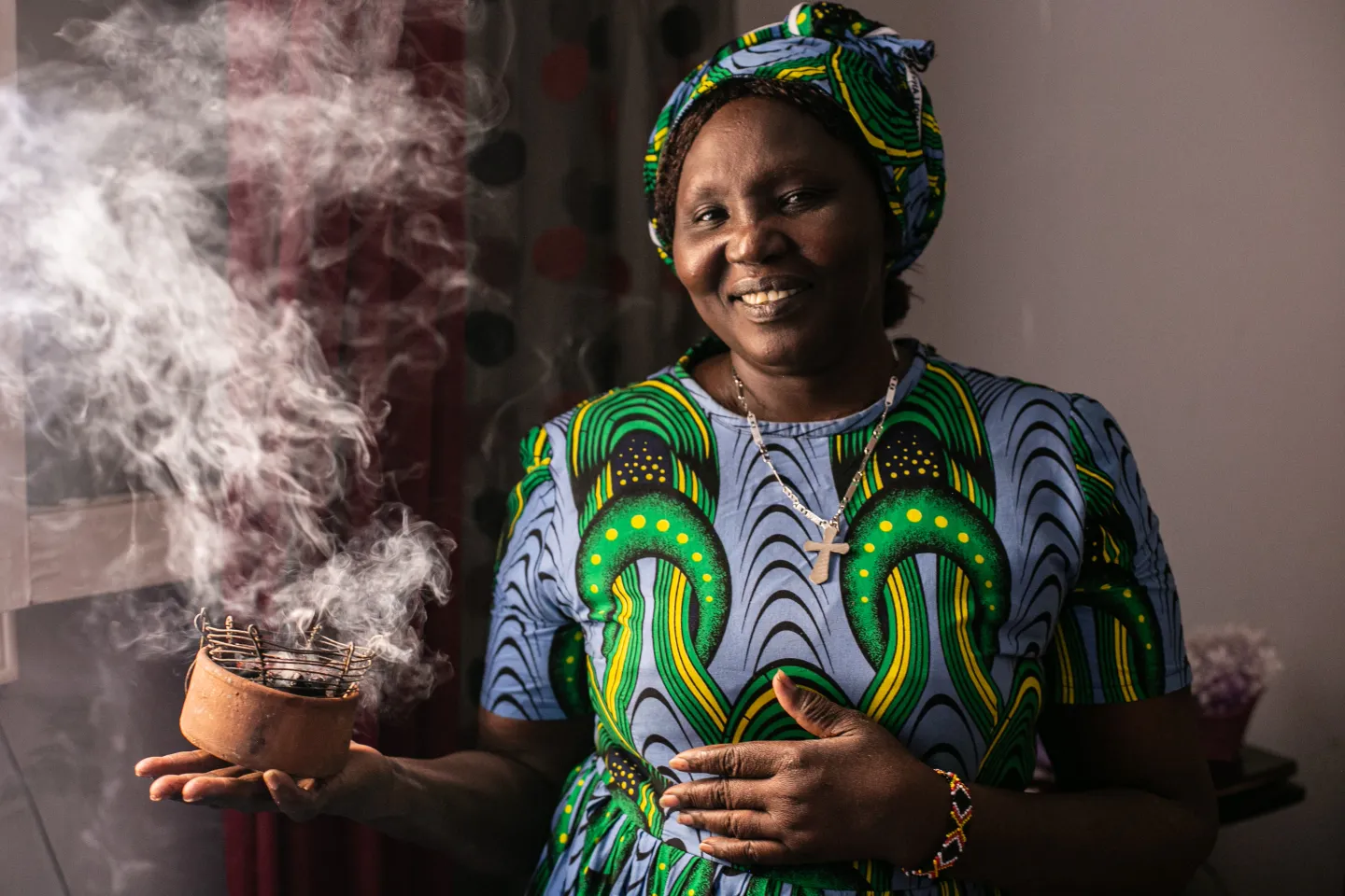 Al Batool showcasing the Sudanese incense sticks from her business