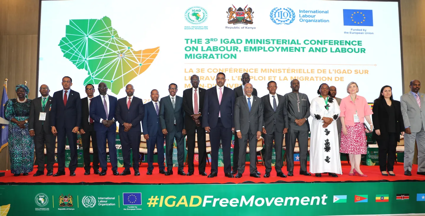Group photo of ministers and other dignitaries on a stage