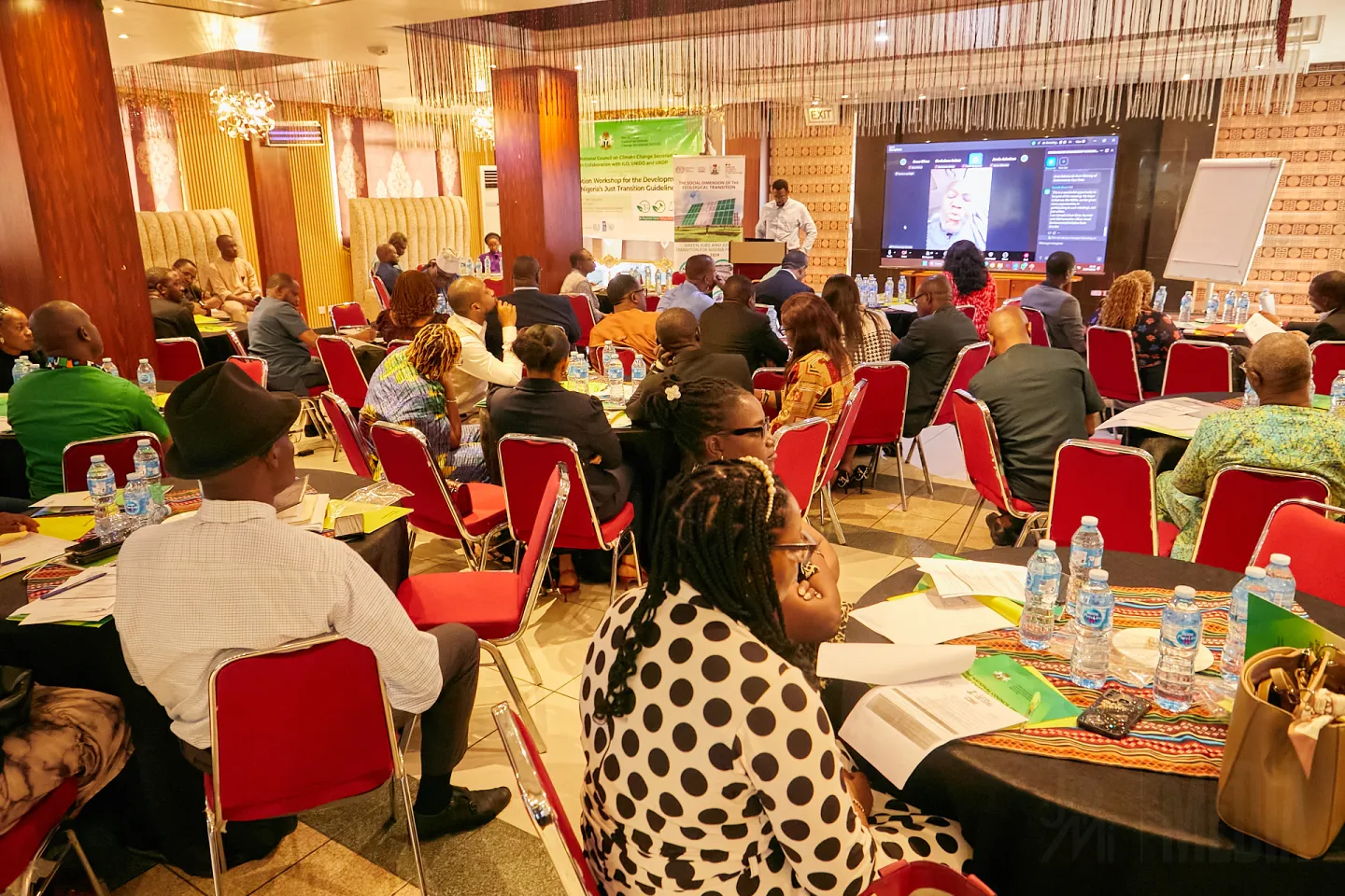 A wide-angle group photograph capturing all participants of the workshop