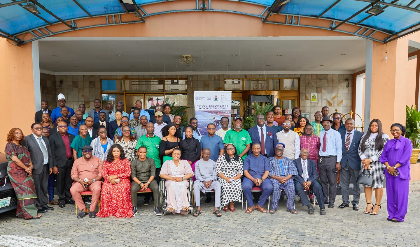 This image captures large and diverse group of participants gathered for a formal group photo