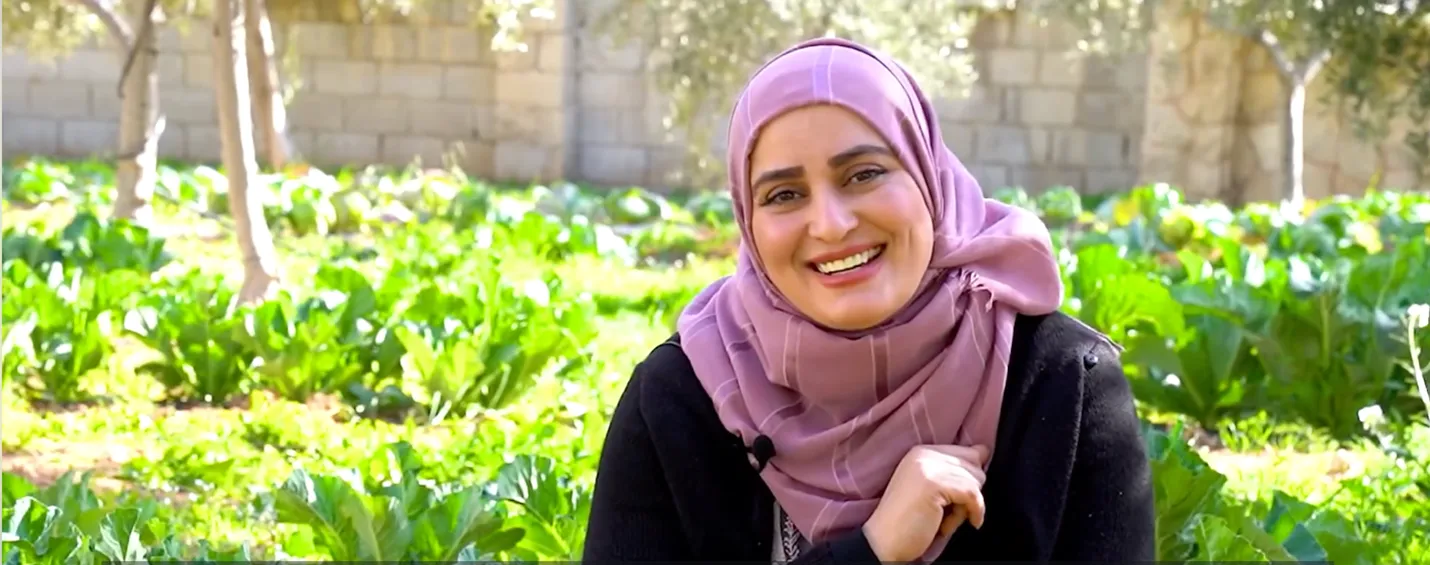 Jordanian woman in her vegetables garden