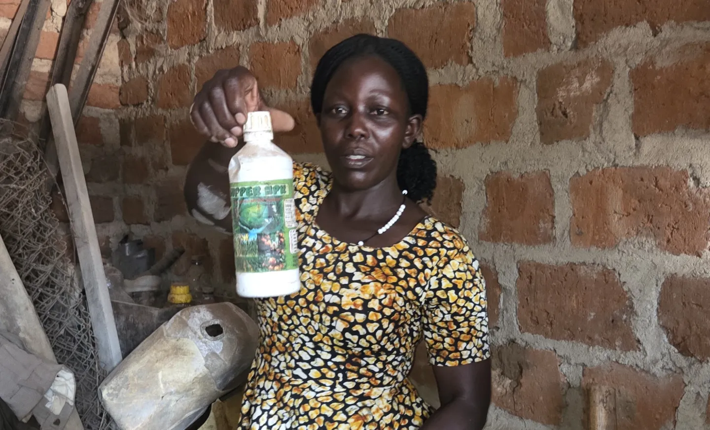 Veronica, a local coffee farmer, explains the measures she takes to safely handle potentially hazardous materials.