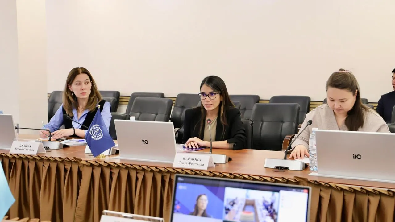 Three people sitting at a table