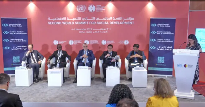 speakers on the podium at the global forum