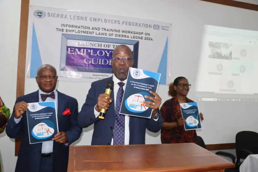 SLEF Chairman Kobi Walker and the Minister of Employment, Labour and Social Security, Mohamed Rahman Swaray launching officially the guide