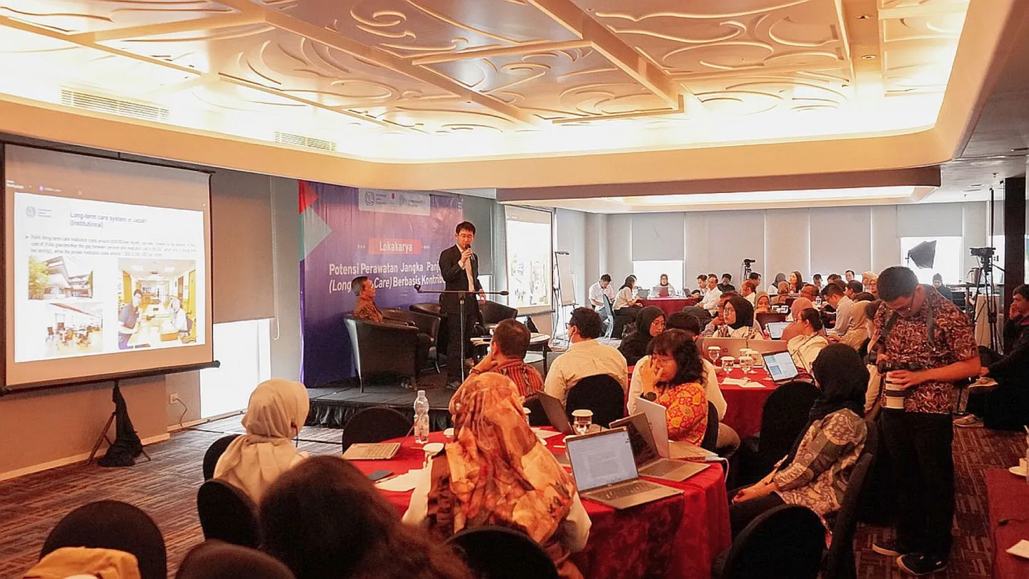 a group of people in meeting