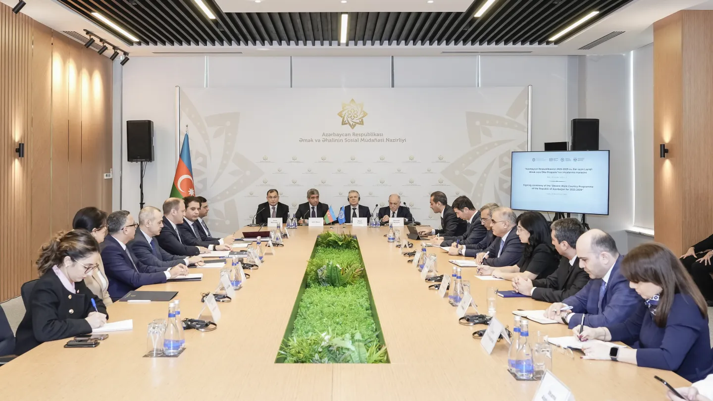 A group of people sitting at a table